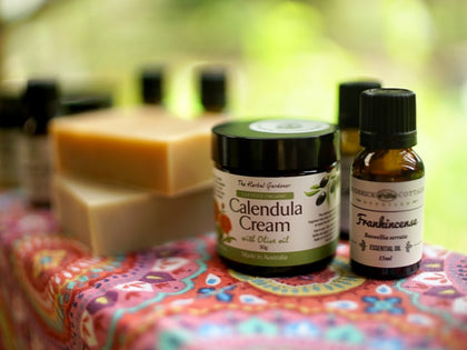 organic face cream, essential oil and soap