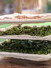 comfrey leaf and root drying on a rack