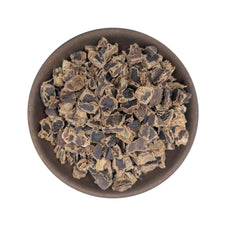 Raw carob kibble in a bowl