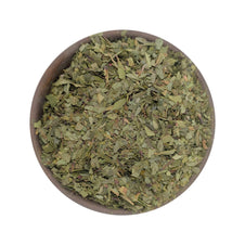 Dried pepperleaf flakes in a bowl